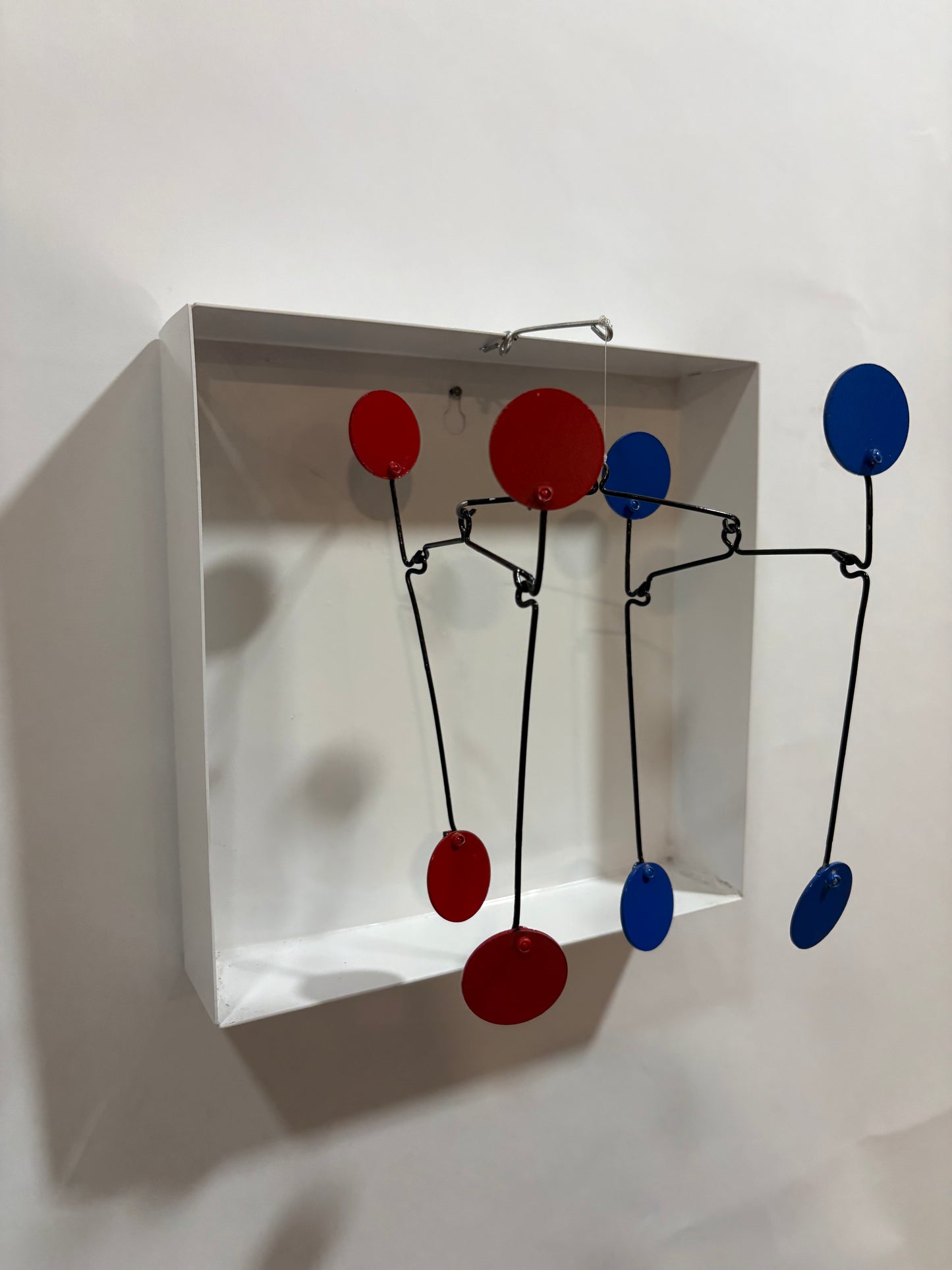 CÓNCLAVE - Móvil de pared - 23x23 cm